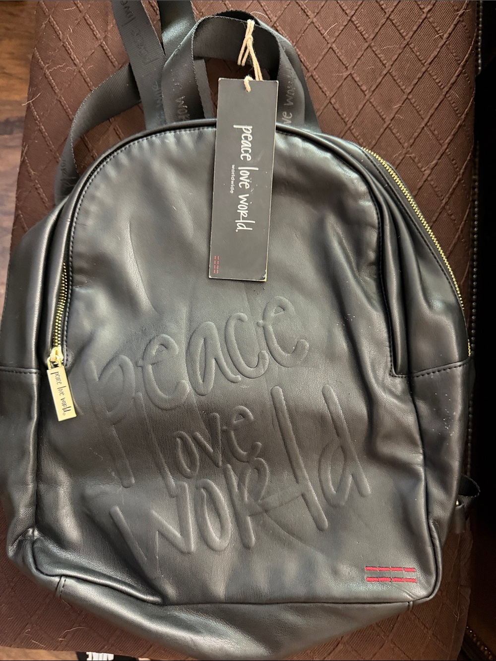 Peace Love World Black Embossed Faux Leather Backpack with Gold Zippers